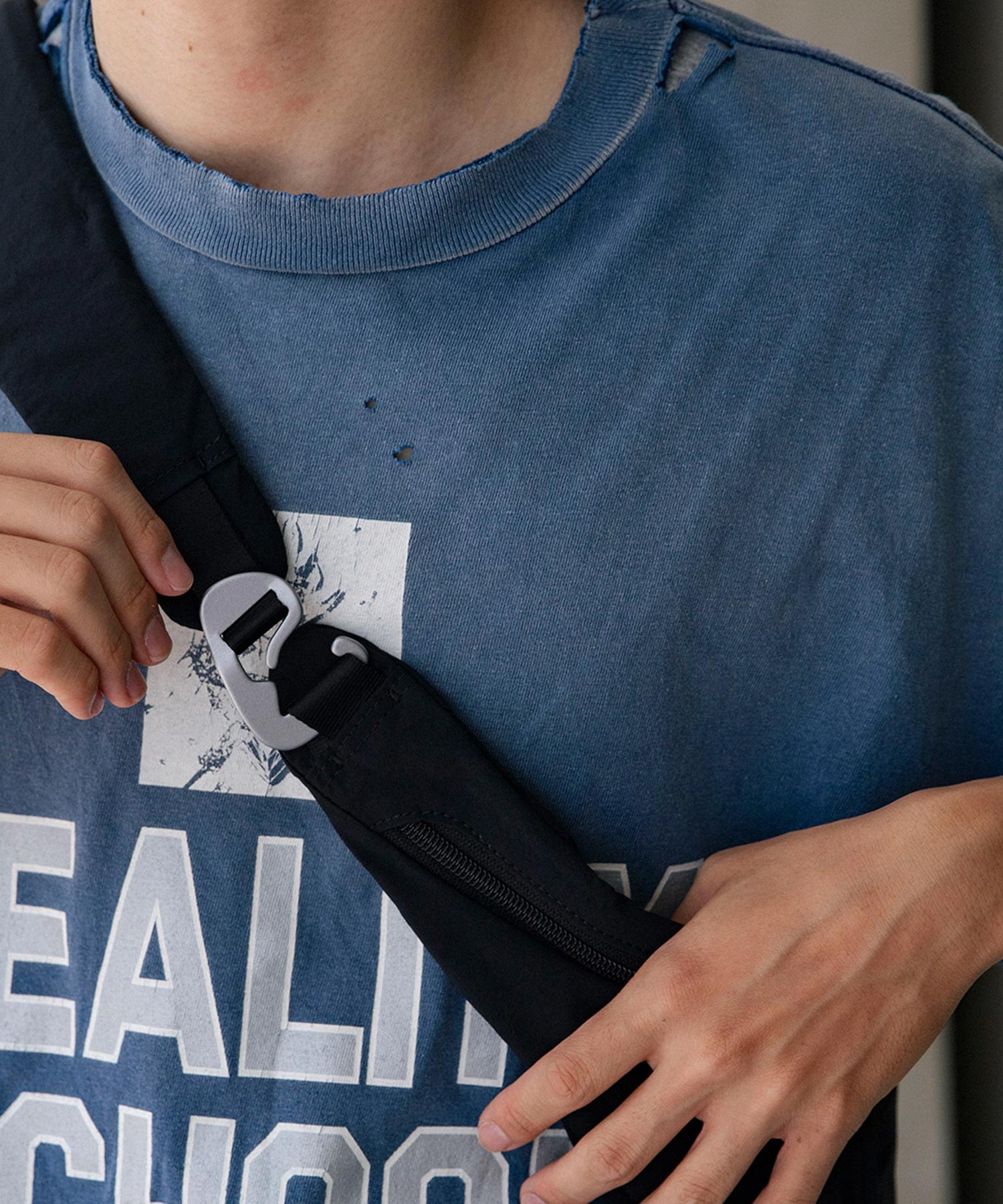 HELICOID ACROSS BODY BAG