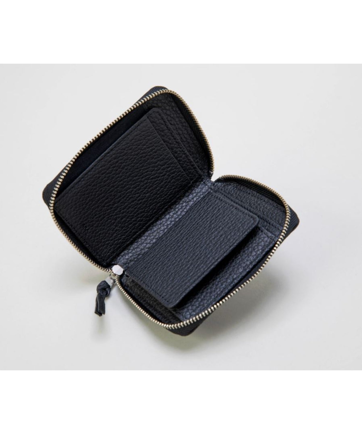 CRISPANIL ROUND PALM WALLET