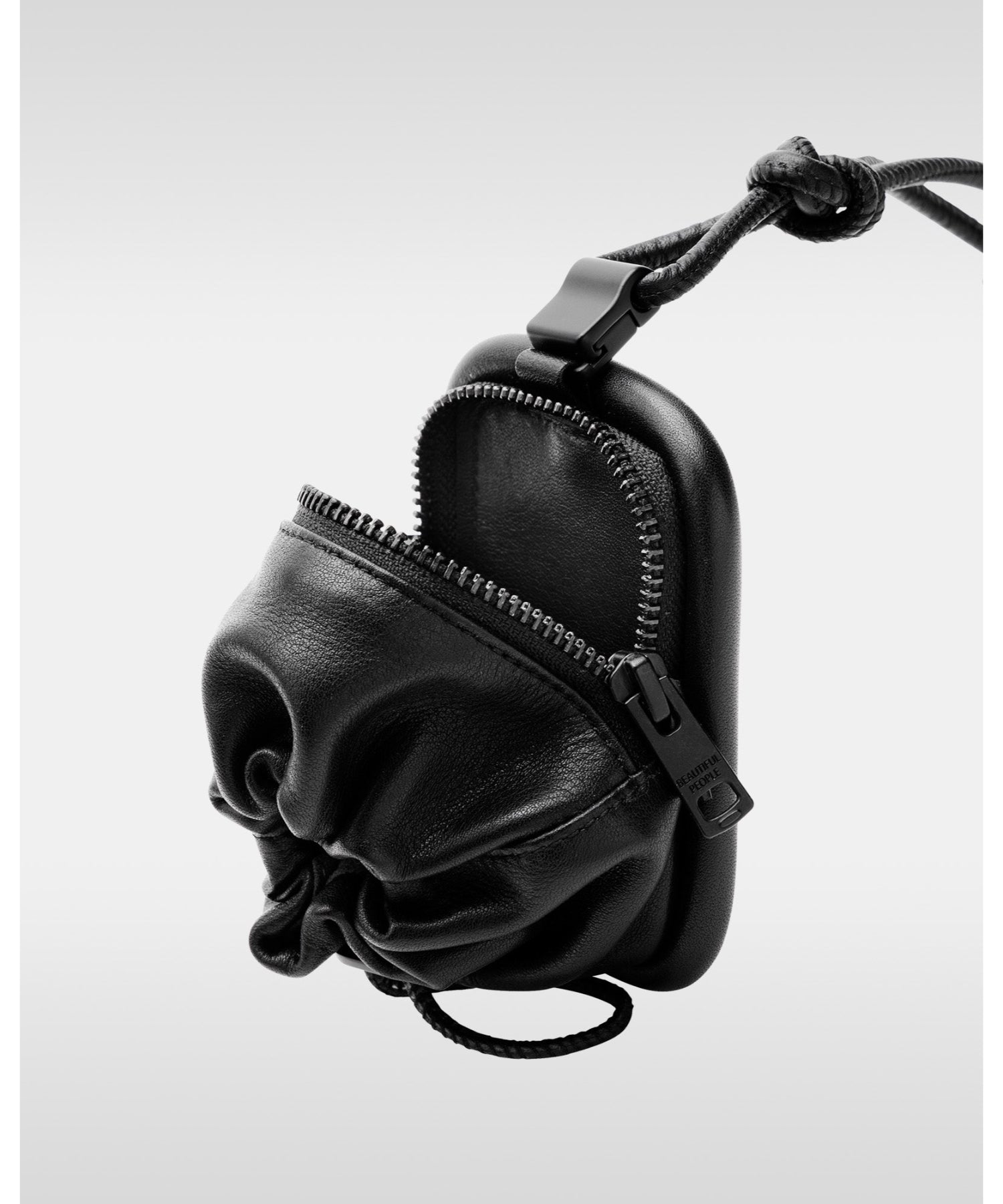 objcts.io over engineering MagWear leather purse