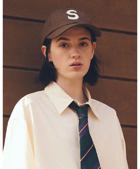 THE S CAP