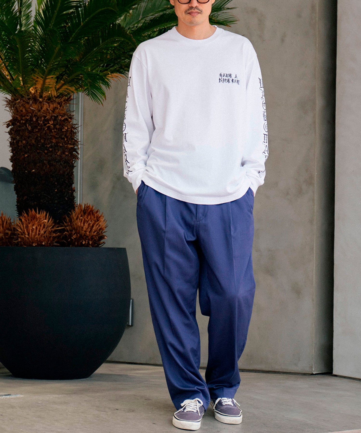 DOUBLE PLEATED CHINO TROUSERS