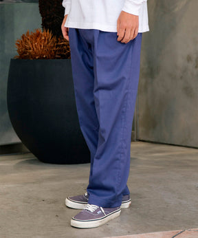 DOUBLE PLEATED CHINO TROUSERS
