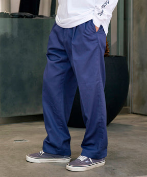 DOUBLE PLEATED CHINO TROUSERS